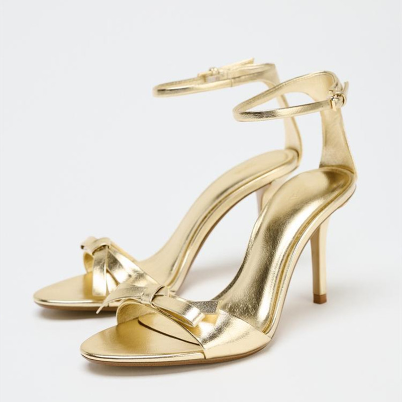 Elegant Golden Bow Brand High  - Metallic Heel Sandal review and price